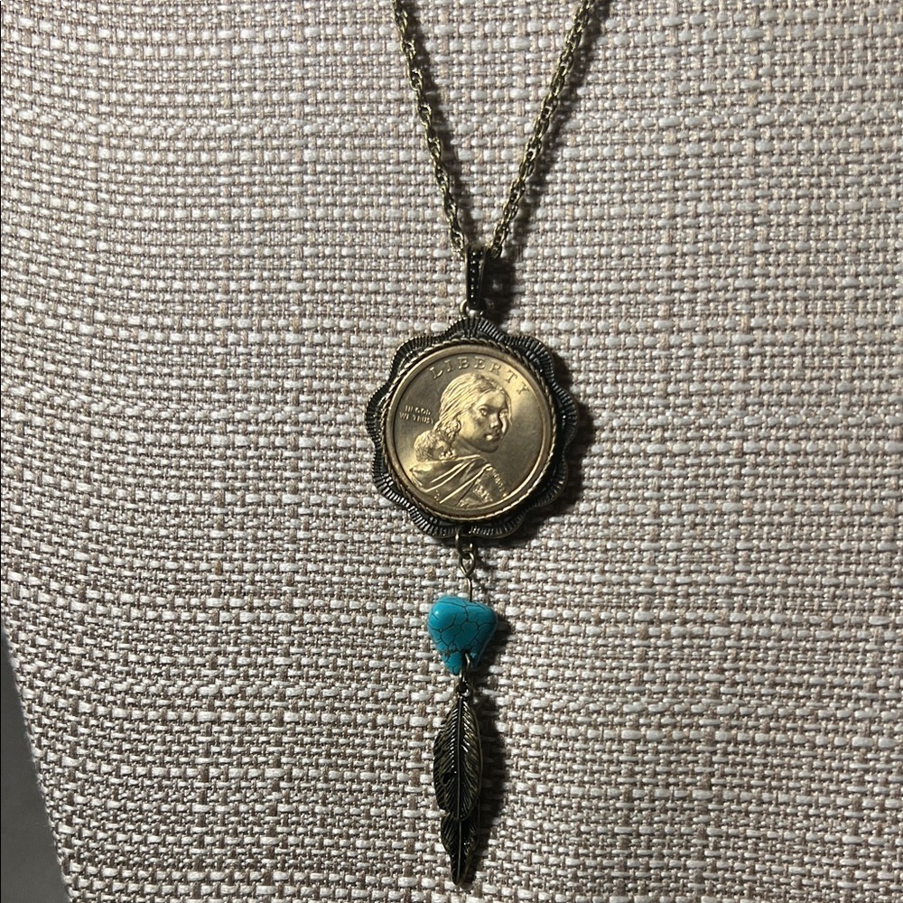 Gold Tone Sasacagewa Coin Pendant Necklace with Turquoise Accent. WA483